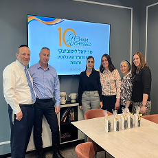 Misrad HaPnim officials visit Chaim V'Chessed offices